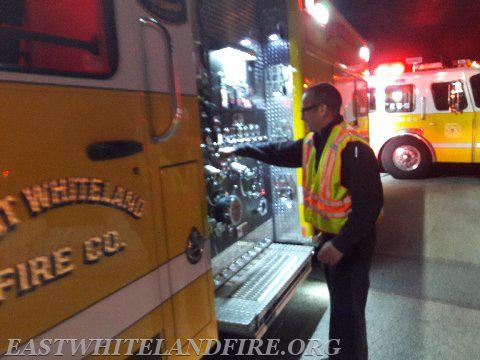 EW Career FF Matt Cole operating pump on Engine 5-1 at car fire on Bacton Hill Road.