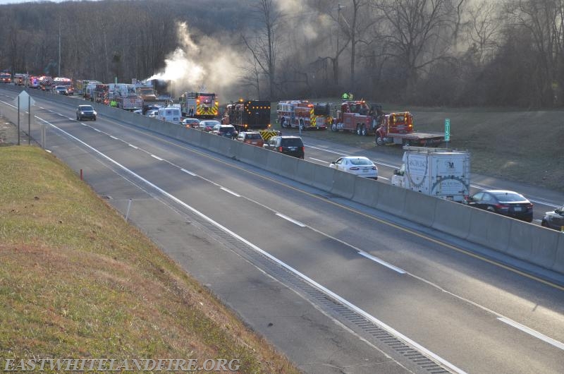 Multiple fire and rescue companies operating at a tractor-trailer fire on the Pennsylvania Turnpike in West Pikeland Township.