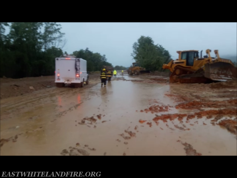 Flooding conditions before rescue at Glasgow Quarry along the south rim. Loads of stone had to be brought in to make the road and work area more secure.