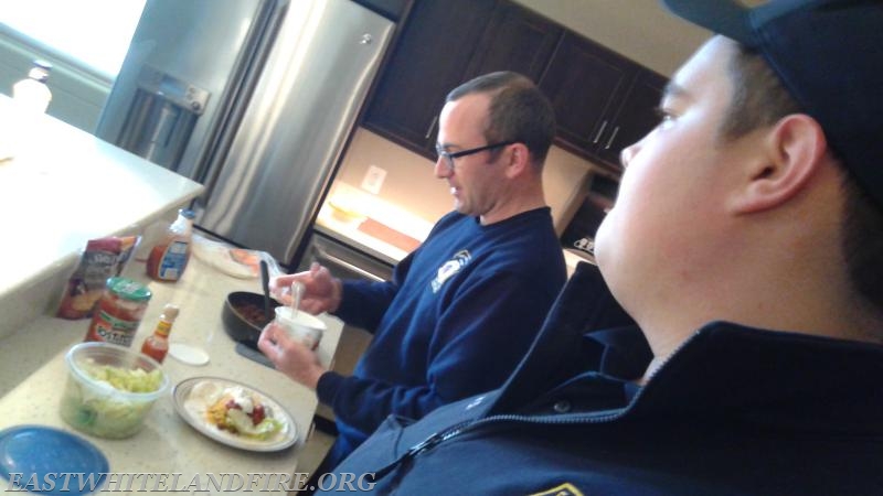 Quintin Lotz watching Matt Cole prepare dinner at Station 5. Matt is an expert cook especially when venison is involved.